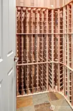 300 bottle capacity wine storage area right off of the wet-bar.