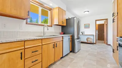 Kitchen is equipped with brand new, never been used, GE appliances