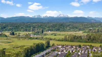 Enjoy parks, a basketball court, soccer field, and play area steps away!