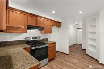 Another perspective of the kitchen highlights the home's seamless flow and functional layout.