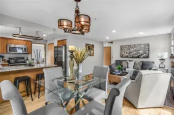Here's a view showing the kitchen next to the kitchen eating area and the family room - so thoughtfully laid out and efficient!