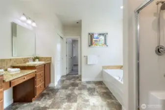 Primary bath with dual sinks, soaker tub plus shower.
