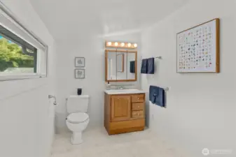 1/2 bath upstairs is very spacious and could accommodate a shower or bathtub.  A 2nd door could also be added to the other upstairs bedroom, making this a shared bath between the 2 rooms.  Tons of potential here without much work.