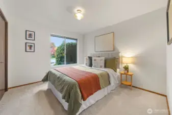 Bedroom Two offers wall-to-wall carpeting, fresh neutral paint, and a generously sized closet.