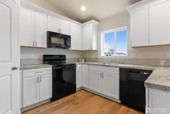 Photo of previously built home. Home may feature additional upgrades not available. Photos/build my vary.