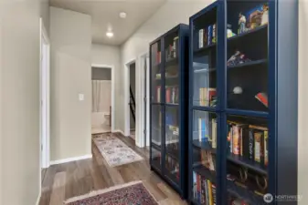 Upstairs to the left is the primary and to the right are the guest bedrooms