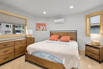 The primary bedroom includes a private, full bathroom for added comfort and convenience.