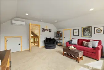 Fully furnished, the upstairs bunk room provides plenty of sleeping accommodations and can also serve as a fun recreational space.