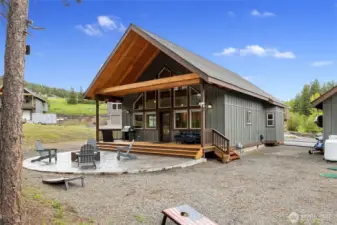 This classic mountain chalet showcases beautiful stained wood beams, adding warmth and character throughout.