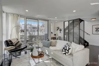 Living room with floor to ceiling aluminum windows