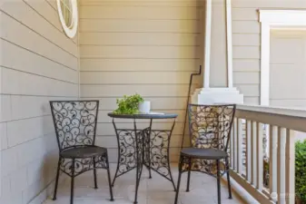 Charming area to just relax and have a cup of coffee on your covered front porch.