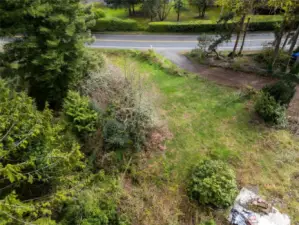 Birds eye view of the parcel facing east towards Vashon Hwy. Yes, there used to be a house on the lot.