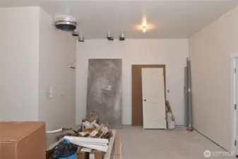 Extra room in garage for workspace or storage.