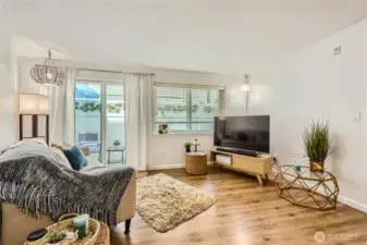 Savvy chic Rare one br  PLUS Den.  This home boasts of lvp flooring  and looks out to patio with new windows and sliding doors