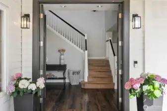 Step through double doors into a home as graceful as its garden.