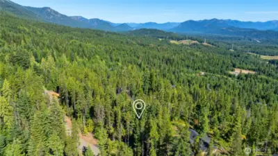 Aerial views of neighborhood and property