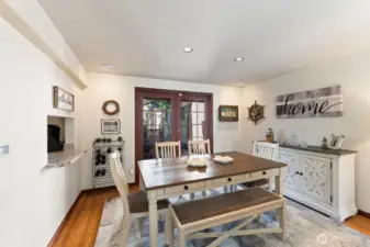Dining with French Doors that open out to the the backyard with easy access to firepit entertaining.