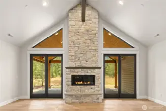 Beautiful fireplace with stone, hearth and mantel.