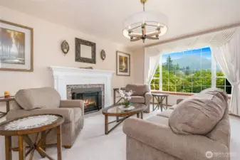 formal living room with gas fireplace.