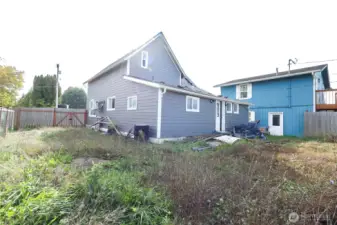 Large yard with room on the side of the home