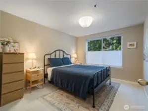 Spacious primary bedroom with north facing window.