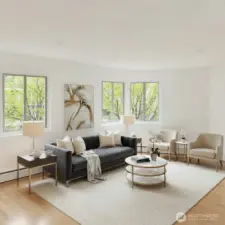 Virtual staged living room option with hardwood.