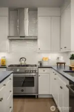 Kitchen featuring a premium stainless steel appliance package. featuring Bertazzoni Italia, Bosch, and Samsung