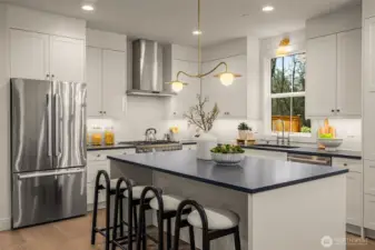Kitchen with quartz  island and countertops.