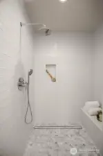 Primary walk-in shower.