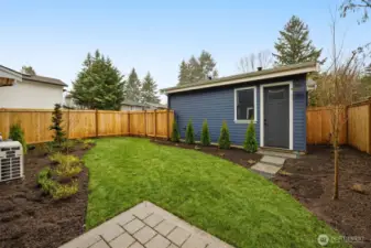 Fully landscaped and fenced rear yard.