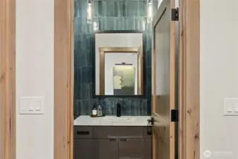 Powder bathroom off of entry