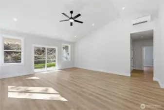 Mini split unit above and in the primary bedroom.  Doorway leads to the primary and two extra bedrooms.