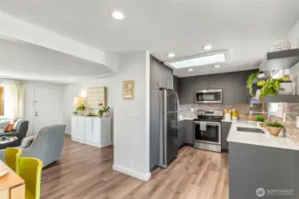 A nice view of the open floor plan from kitchen to dining to living areas