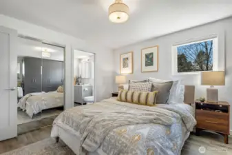 Glimpse of the en-suite bathroom in the primary bedroom