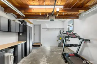 Attached single car garage, currently only used as storage.  There is also ample overhead stoarge