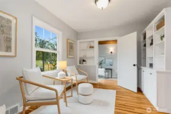 Located to the left of the front door, this room was originally used as a dining space.