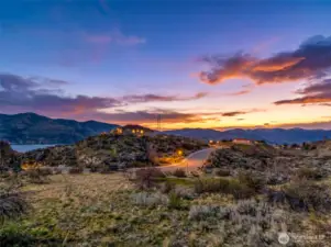 Envision a custom home on this lot capturing Lake Chelan glimpses and wide-reaching mountain and territorial views at 104 Crest Drive.