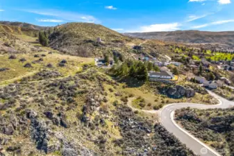 Drive your golf cart from this lot to the Lake Chelan Municipal Golf Course—enjoy the ultimate Lake Chelan lifestyle.