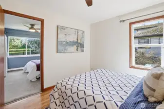2nd bedroom with South facing window and access to the third bedroom.
