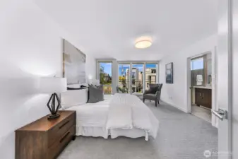 Primary bedroom with walk in closet and en-suite bath.