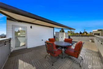 Retractable awning with remote control for easy use.