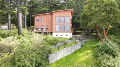 View of the house, showing path to beach