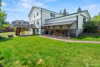 Great deck off the back of the house and plentiful undercover storage too!