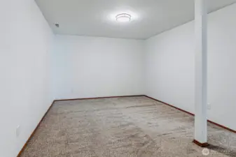 Windowless room downstairs would make a PERFECT theater room!