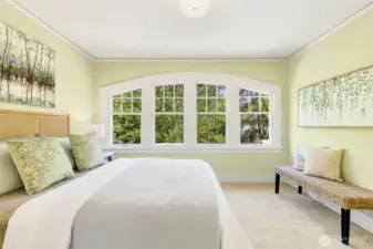 Largest of the three bedrooms with gorgeous window.