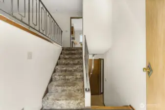 Split-entry style offers great separation of space—up for entertaining, down for movie nights, guests, or a home office.