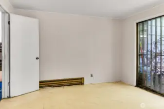 Bonus room with sliding door to the outside.