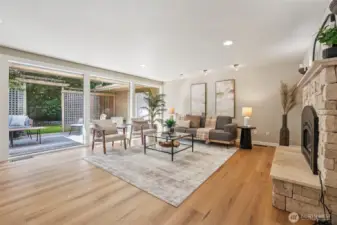 Stunning floor to ceiling window wall flooding the home with natural light.