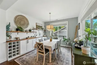 Beautiful built-in sideboard with decorative shelving in the dining room.