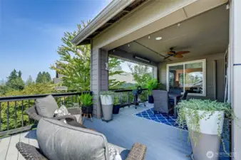 The extended deck runs the length of the house to take in the view and enjoy the sun.